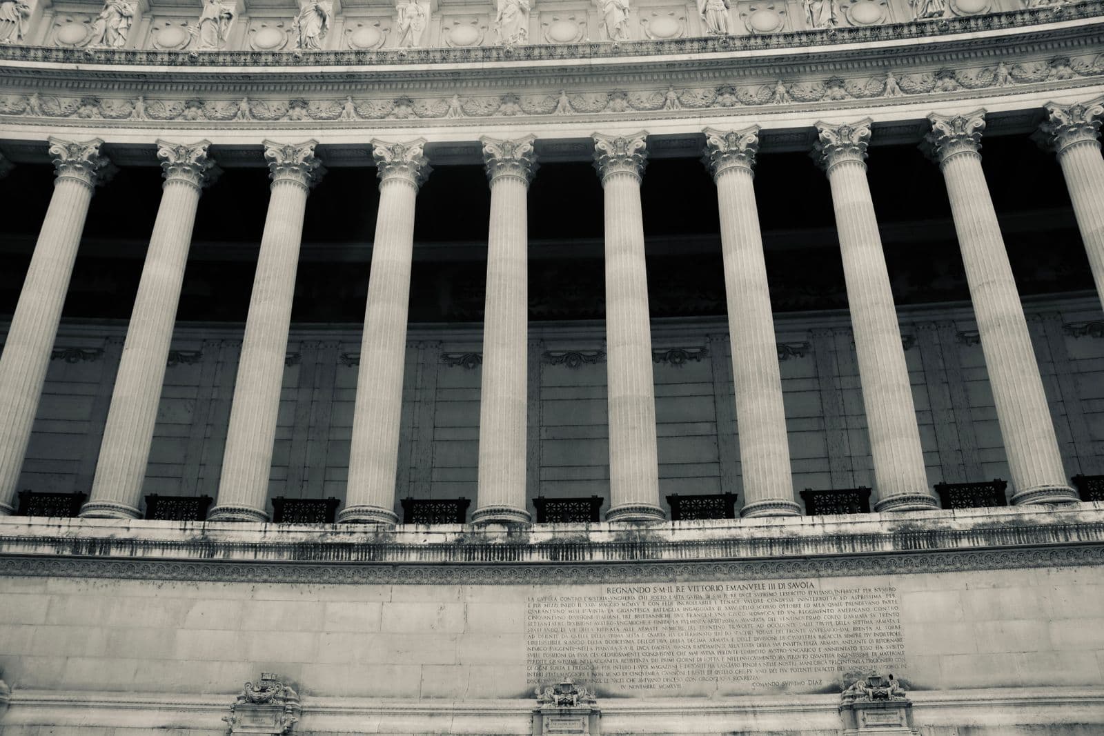 Detailed view of neoclassical columns in a government building facade.