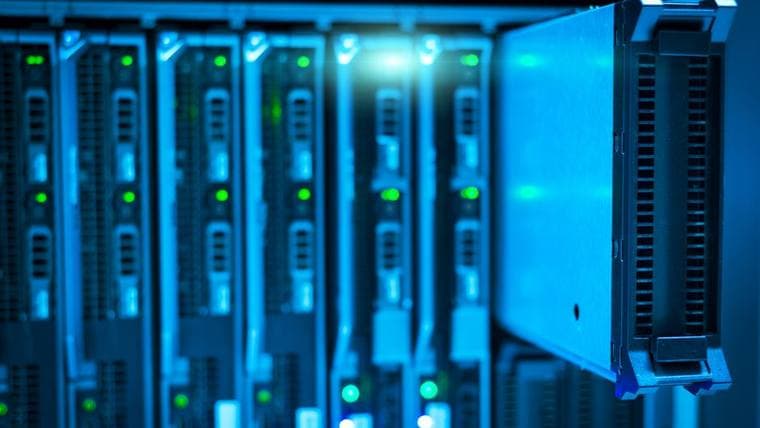 Racks of servers lit in blue